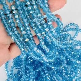 Кришталеві намистини 4,4х6мм (Рондель) аквамаринового кольору