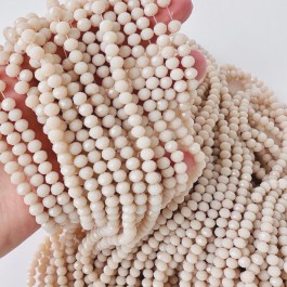 Кришталеві намистини 4,4х6мм (Рондель) матового нюдового кольору