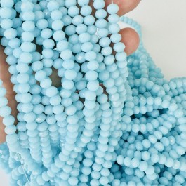 Кришталеві намистини 4,4х6мм (Рондель) блакитного кольору