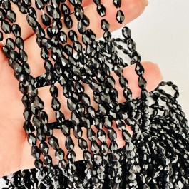 Кришталеві намистини 4х6мм (Капля) чорного кольору