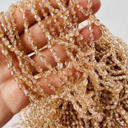 Кришталеві намистини 4х6мм (Капля) кольору капучіно