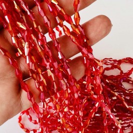 Кришталеві намистини 4х8мм (Рис) червоного кольору