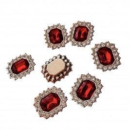 Стразова серединка червоного кольору в пластиковій оправі 2,3х2см