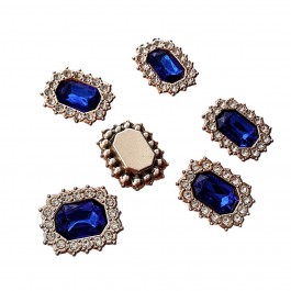 Стразова серединка синього кольору в пластиковій оправі 2,3х2см