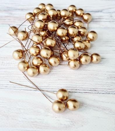 Кульки на проволці золотого кольору