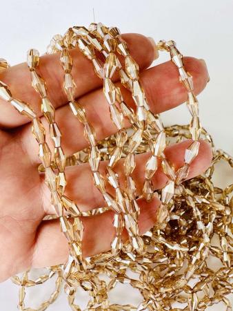 Кришталеві намистини 4,3х8,4мм (Рис) кольору капучіно