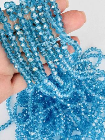 Кришталеві намистини 4,4х6мм (Рондель) аквамаринового кольору