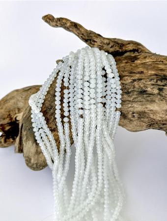 Кришталеві намистини 4,4х6мм (Рондель) опалового кольору