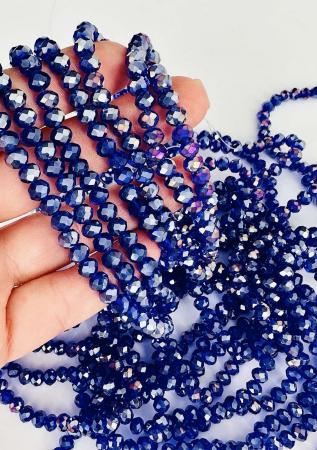 Кришталеві намистини 4,4х6мм (Рондель) АВ синього кольору