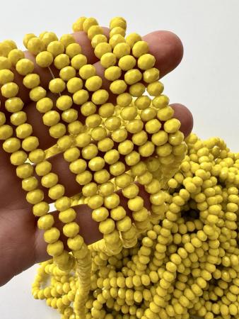 Кришталеві намистини 4,4х6мм (Рондель) жовтого кольору
