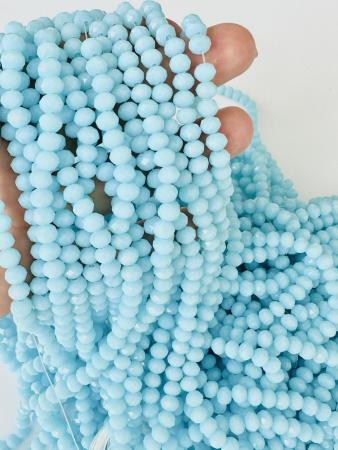 Кришталеві намистини 4,4х6мм (Рондель) блакитного кольору