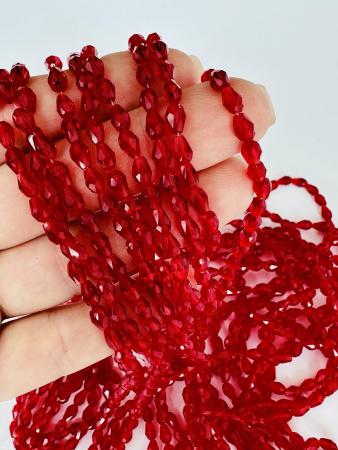 Кришталеві намистини 4х6мм (Капля) гранатового кольору