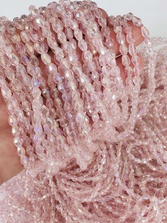 Кришталеві намистини 4х6мм (Капля) АВ ніжно-рожевого кольору