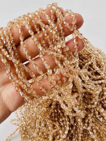 Кришталеві намистини 4х6мм (Капля) кольору капучіно