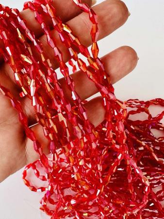 Кришталеві намистини 4х8мм (Рис) червоного кольору