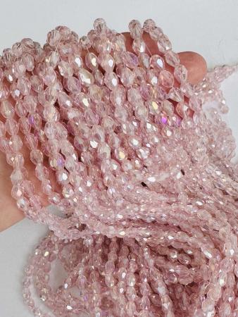 Кришталеві намистини 6х8мм (Капля) ніжно-рожевого кольору