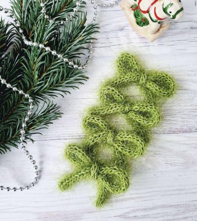 В'язані бантики-шнурочки салатового кольору ручної роботи