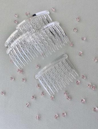 Гребінець для волосся пластиковий 7,8х5,3см прозорий (17 зубчиків)