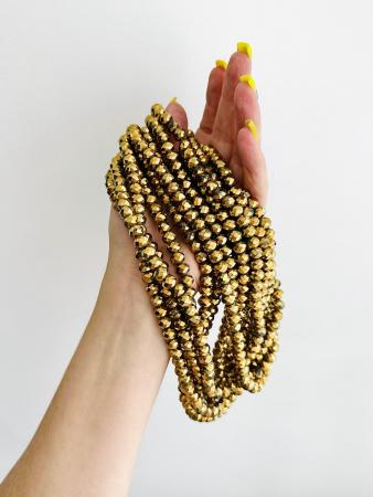 Кришталеві намистини 6х8мм (Рондель) золотого кольору