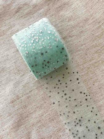 Фатин світлий тіффані в срібні зірочки